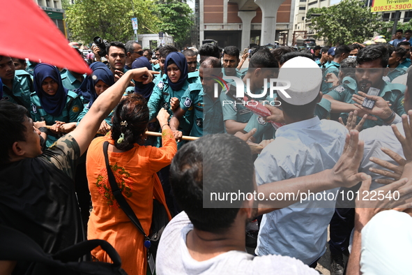 Police scuffle with disabled people as they protest demanding to raise their government allowance, in Dhaka, Bangladesh, on June 4, 2023 