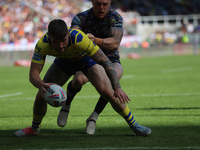 Warrington Wolves' Connor Wrench goes over for a try during the BetFred Super League match between Hull Football Club and Warrington Wolves...