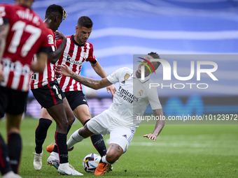 Eder Militao of Real Madrid Cf battles for the ball during a match between Real Madrid v Athletic Club as part of LaLiga in Madrid, Spain, o...