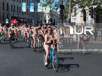 LONDON, UNITED KINGDOM - JUNE 10, 2023: Nude cyclists ride across the capital during the World Naked Bike Ride in London, United Kingdom on... by WIktor Szymanowicz/NurPhoto