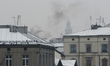 A view of the unhealthy smke coming out from the chimney of a house in Podgorze district....
