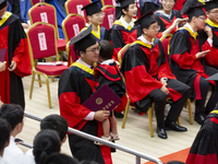 A general view of the 2023 graduation ceremony of China University of Petroleum in Qingdao, Shandong Province, China, June 20, 2023. Thousan...