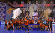 Maharashtra Ironmen  Captain Igor Chiseliov lift the trophy as teammates celebrate after w...