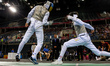 YUNES Klod of Ukraine (L) and RIEGER Laurenz fight Men's Foil Individual, Table 8 during...