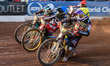 Norick Blodorn (Blue) rides between Rory Schlein (Yellow) and Ryan Douglas (White) during...