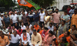 BJP (Bharatiya Janata Party) Party members staged a protest against violence and murder of...