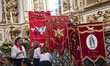 People lay the Banners and Crowns of the Holy Spirit on the altar of the Church Saint John...
