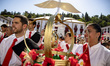 People attend the Festa dos Tabuleiros (Festival of the trays) in Tomar, Portugal on July...