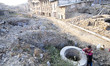 A Local woman refilling water for daily use from ancient water well at Bhaktapur, Nepal 30...