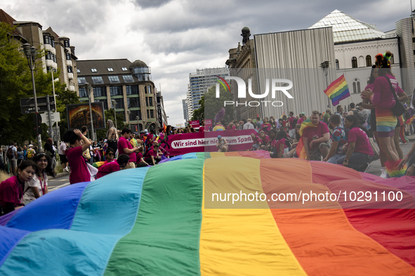 People carrying a huge rainbow flag attend the 45th Christopher Street Day (CSD) Berlin Pride demonstration, in Berlin, Germany on July 22,...