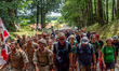 Thousands of participants are seen walking the famous Groesbeek green hills, during the 10...