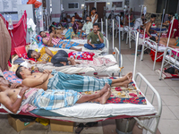 People suffering from dengue fever as they admitted for treatment at a government hospital in Dhaka, Bangladesh, on July 26, 2023. The dengu...