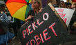 KRAKOW, POLAND - JULY 25, 2023:An activist holds a placard with words 'Women's Hell as Pr...