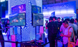 general view of visitors are seen playing games at Play station booth during the chinajoy...