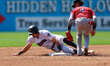 Somerset Patriots Max Burt #10 is caught stealing as Rumble Ponies Jeremiah Jackson #4  la...