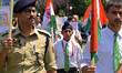 School students take part in Tiranga Rally under 'Meri Maati Mera Desh'  in Srinagar, Kash...