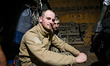 UKRAINE - AUGUST 11, 2023 - Servicemen stay in a dugout as the artillery unit of the 128th...