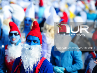 People in Smurfs-costumes dance at a Smurf-gathering in Waldshut-Tiengen, Germany on February 6, 2016. (