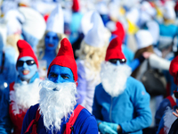 People in Smurfs-costumes dance at a Smurf-gathering in Waldshut-Tiengen, Germany on February 6, 2016. (