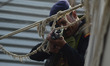 An Indian commando of ATS (Anti Terrorist Squad) takes part in a mock drill, at Magh Mela...