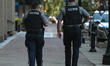 EDMONTON, CANADA - AUGUST 19, 2023:Two Peace Officers on patrol through the streets of do...