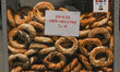KRAKOW, POLAND - AUGUST 13, 2023:A street stand with traditional fresh Krakow Bagel/Pretz...