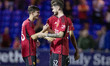 Joe Hugill #52 of Manchester United celebrate the win on penalties 3-5 during the EFL Trop...