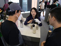 SHANGHAI, CHINA - AUGUST 29, 2023 - International exhibitors and business people visit at the International Intelligent Building Exhibition,...