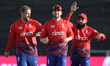 England celebrate after Daryl Mitchell of New Zealand is caught out against Liam Livingsto...