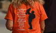 EDMONTON, CANADA - AUGUST 24, 2023:A person wearing a t-shirt with Geoffrey Canada quote...