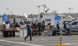 South Korean TV live broadcasting team gather in Dora CIQ near the border village of Panmu...