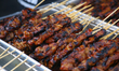 Chicken skewers at a food stall during the Taste of Manila Food Festival in Toronto, Ontar...
