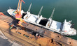 LIANYUNGANG, CHINA - SEPTEMBER 10, 2023 - A cargo ship is unloading a batch of electric co...
