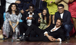 Indian actor Shah Rukh Khan poses for a photo shoot with the film director Atlee during a...