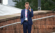 Andy Street, the Mayor of the West Midlands, on his phone during the Conservative Party Co...