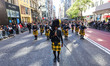 {person} marches up 5th Avenue in the Columbus Day Parade in New York , Monday, Oct. 9, 20...