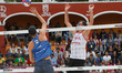 Theo Brunner of  USA (L)  competes against Michal Bryl of Poland  (R)   during the Beach V...