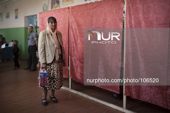 Citizens of Slavyansk vote in the referendum on independence from Ukraine organized by the People's Republic of Donetsk on May 11th, 2014. 