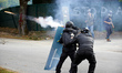 Black blocks use fireworks against gendarmerie mobile (riot polie). Nearly 10 000 people p...