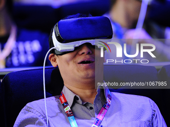 A man reacts as he uses a new Samsung Gear 360 Vr , during the second day of Mobile World Congress 2016 in Barcelona, 23rd of February, 2016...