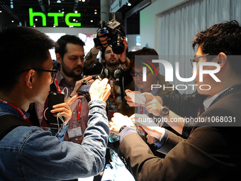 A member of HTC, showing the new HTC Vive, virtual 360 degree glasses, to the press, during the second day of Mobile World Congress 2016 in...