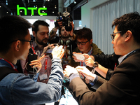 A member of HTC, showing the new HTC Vive, virtual 360 degree glasses, to the press, during the second day of Mobile World Congress 2016 in...