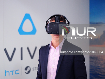 A congressman testing the new HTC Vive, virtual 360 degree glasses, exhibited, during the second day of Mobile World Congress 2016 in Barcel...