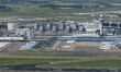 Aerial panoramic view of Amsterdam Schiphol Airport AMS EHAM from a departing airplane win...