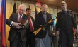 Afghanistan-KAbul: Russian Federation Ambassador, Alexander Mantytskiy, left, hands over a...