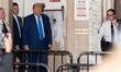 Donald Trump enters the courtroom as he continues his civic fraud trial at the NYS Supreme...