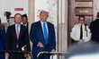 Donald Trump enters the courtroom as he continues his civic fraud trial at the NYS Supreme...