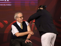 October 24, 2023, Mexico City, Mexico: Mexican Health Secretary Jorge Alcocer is vaccinated against influenza and Covid during the daily mor...