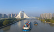 HUAI'AN, CHINA - OCTOBER 26, 2023 - Ships carrying various materials such as coal and buil...