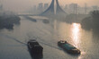 HUAI'AN, CHINA - OCTOBER 26, 2023 - Ships carrying various materials such as coal and buil...